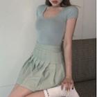 Short-sleeve Cropped T-shirt / Pleated Mini A-line Skirt