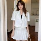 Short-sleeve Double-breasted Cropped Blazer / Mini Pleated A-line Skirt