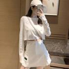 Long-sleeve Cropped T-shirt / A-line Mini Skirt