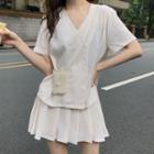 Double-breasted Short-sleeve Shirt / Pleated A-line Skirt