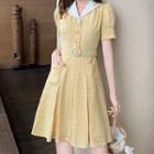 Round Buckled Short-sleeve Floral Print A-line Dress