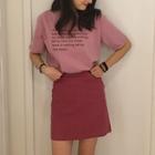 Lettering Short-sleeve T-shirt / Plain A-line Skirt