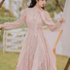 Tie-neck Puff-sleeve Fringed Midi A-line Dress