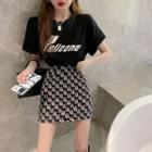 Short-sleeve Lettering T-shirt / Lettering A-line Skirt