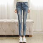 Distressed Paint Splattered Skinny Jeans