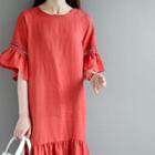 Perforated Sleeve Ruffle-hem Dress