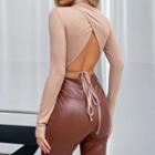 Long-sleeve Mock-neck Open-back Top