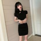 Mock-neck Plain Cutout Top / High-waist Skinny Mini Skirt