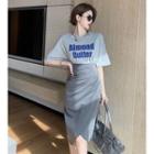 Printed Loose T-shirt / Asymmetrical Wrapped Midi Skirt