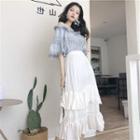 Short-sleeve Off-shoulder Frayed Top / High-waist Pleated Layered Ruffled Skirt