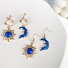 Non-matching Moon & Sun Dangle Earring