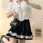 Puff-sleeve Tie-front Frill Trim Top / Eyelet Lace Trim Mini A-line Skirt