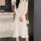 Long-sleeve Buttoned A-line Midi Knit Dress