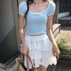 Short-sleeve Bow-accent Crop Top / Tiered Mini A-line Skirt