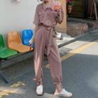 Short-sleeve Tie-cuff Jumpsuit