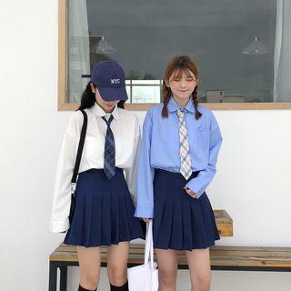 Plain Shirt With Neck Tie / Pleated Skirt