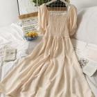 Ruffled-trim Smocked Midi Dress