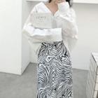 V-neck Blouse / Patterned Midi Skirt