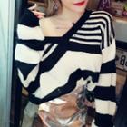 Set: Striped V-neck Sweater + Faux Leather A-line Skirt
