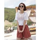 Tie-neck Short-sleeve Embroidered Top