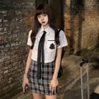 Short-sleeve Shirt / Plaid A-line Skirt / Neck Tie