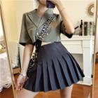 Plain Loose-fit Short-sleeve Crop Shirt / Pleated Skirt