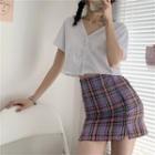 Short-sleeve V-neck Plain Top / Plaid Mini Skirt