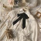 Ruffle Trim Tie-neck Long-sleeve Blouse