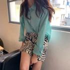 Loose-fit Light Shirt / Zebra-print Mini Skirt