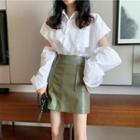 Plain Cut-out Blouse / High-waist Mini A-line Skirt