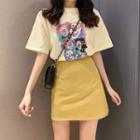 Clown-print T-shirt / High-waist Skirt