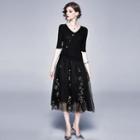 Set: Elbow-sleeve Knit Top + Star Embroidered A-line Midi Skirt
