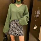 Turtleneck Cutout-front Sweater / Zebra Print Mini Skirt