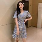 Short-sleeve Asymmetric Buttoned Plaid A-line Mini Dress