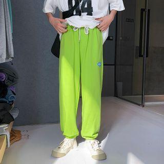 Elastic-waist Applique Straight-leg Jogger Pants