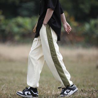 Lettering Embossed Contrast Trim Sweatpants