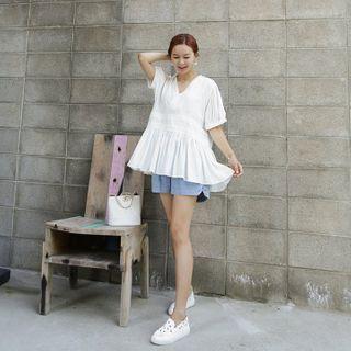 Ruffle-hem Wrap Blouse