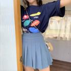 Printed Elbow-sleeve T-shirt / Mini Pleated Skirt