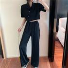 Elbow-sleeve Asymmetric Buttoned T-shirt / Wide-leg Pants