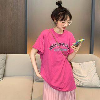 Crew-neck Printed Letter Oversized Tee / Plain Pleated Midi Skirt