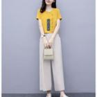Set: Short-sleeve V-neck Blouse + Wide Leg Pants