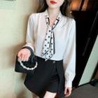Long-sleeve Embellished Dotted Tie Blouse