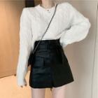 Cable Knit Sweater / Faux Leather Mini Skirt