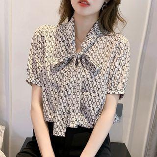 Short-sleeve Patterned Tie-neck Blouse