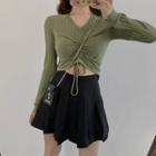 Drawstring V-neck Long-sleeve Crop Top / High-waist Pleated Mini Skirt