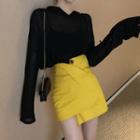 Open-back Long-sleeve Top / Asymmetric A-line Mini Skirt