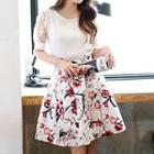 Set: Short-sleeve Top + Floral Print A-line Skirt