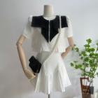 Set: Short-sleeve Cropped Jacket + Pleated Mini A-line Skirt