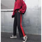 Embroidered Cropped Zip Jacket / Striped Drawstring Pants