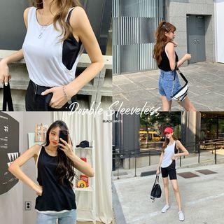 Slit-detail Contrast-layered Sleeveless Top
